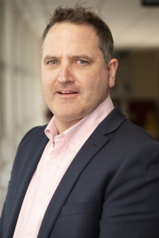 Official institutional portrait of Prof. Joseph M. Queally